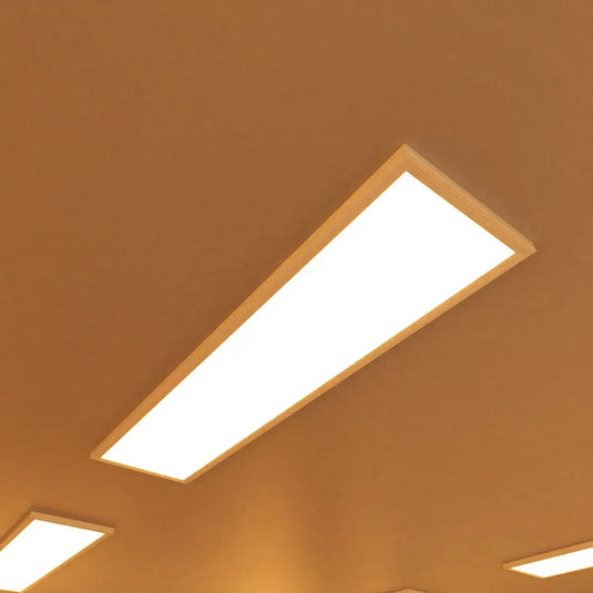 ceiling with mounted 1200x300mm surface-mounted CCT LED panels - warm white