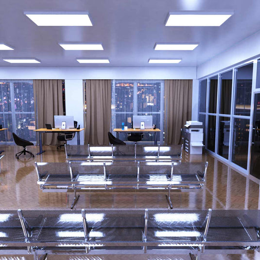 Office lit by surface mounted LED panels in cool white