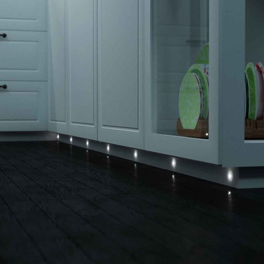Plinth light fitted under kitchen cabinets