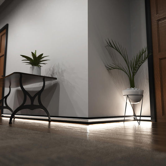 Hallway with black skirting profile lit in natural white