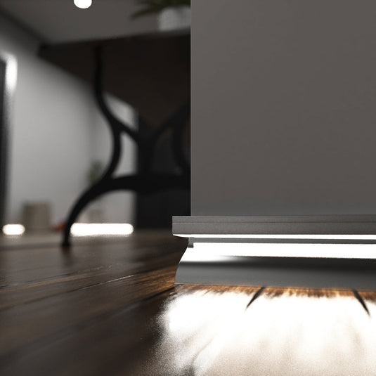 Close up of silver skirting profile lit in natural white