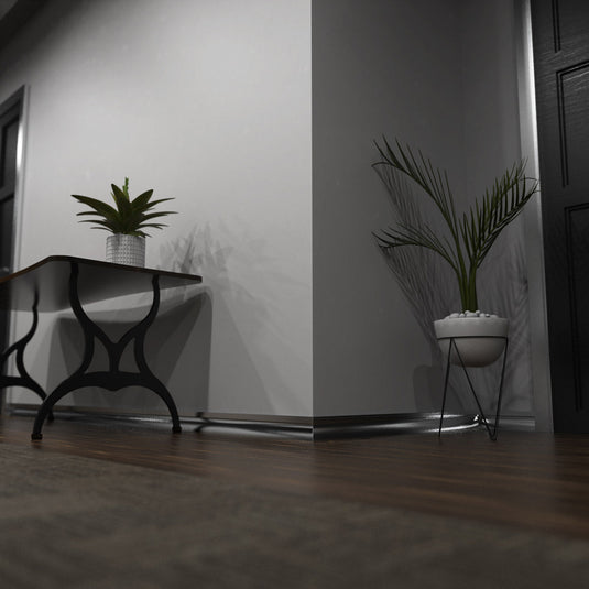 Silver skirting profile around a hallway corner