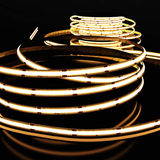 Length of lit warm white COB LED strip