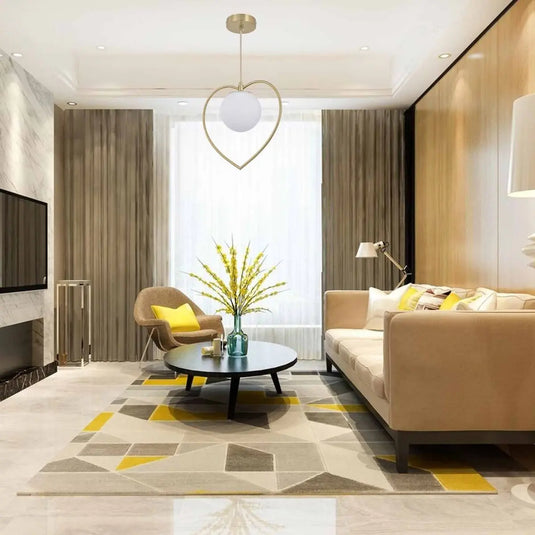 Heart Shaped Pendant Light with a Glass Sphere in living setting