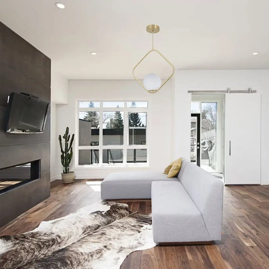 Diamond Shaped Pendant Light with a Glass Sphere, E27 Mounted On Top Of A Living Room Setting