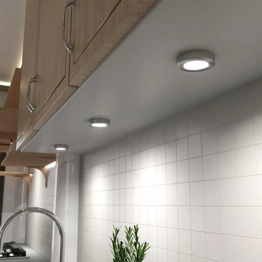 Kitchen counter cabinet with surface mounted under cabinet light in natural white light