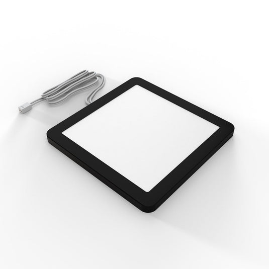 Matt black cabinet light with its cable, another view