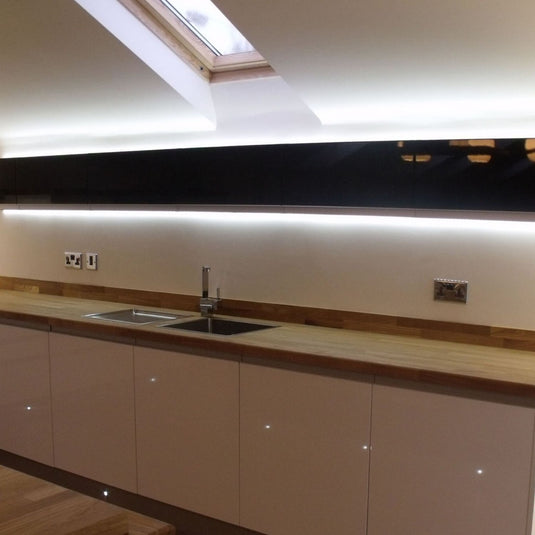kitchen with cool white LED strip light