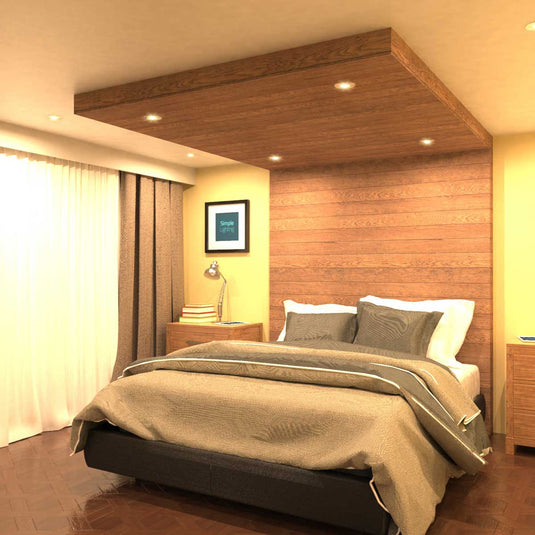 bedroom with a fire-rated downlight in warm white light