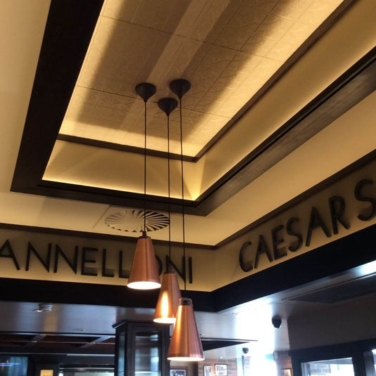 LED strip with warm white light on a ceiling