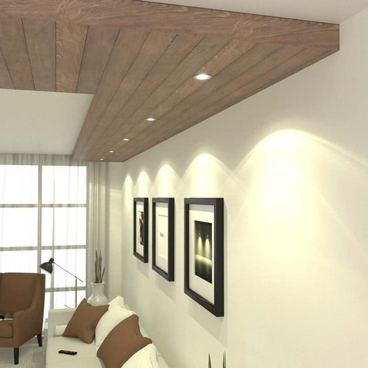 Fire rated downlights with a warm white light installed in a wood ceiling