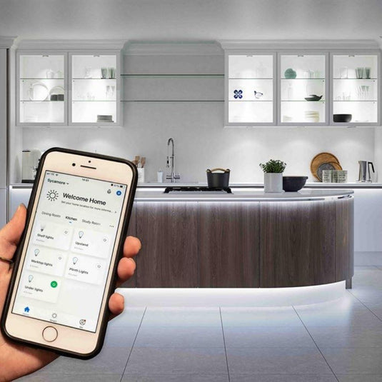 smartphone and a kitchen with white lights
