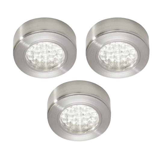 three surface mounted under cabinet light with cool white light