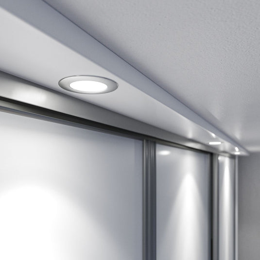 mounted recessed under cabinet light in brushed chrome  with natural white light