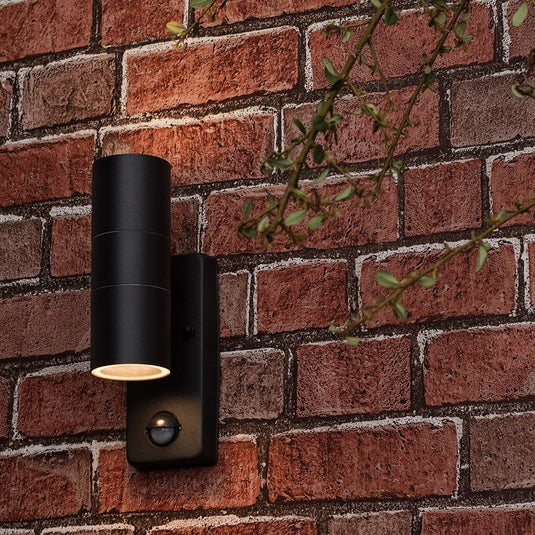black twin wall light with PIR sensor on a wall