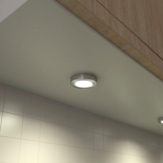 Under cabinet light in brushed chrome with warm white light
