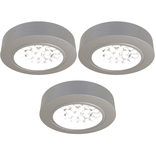 three surface mounted under cabinet light with cool white light
