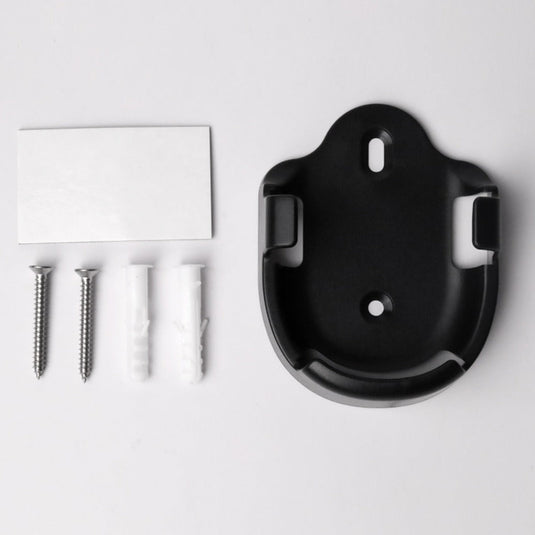 Black remote holder with its screws