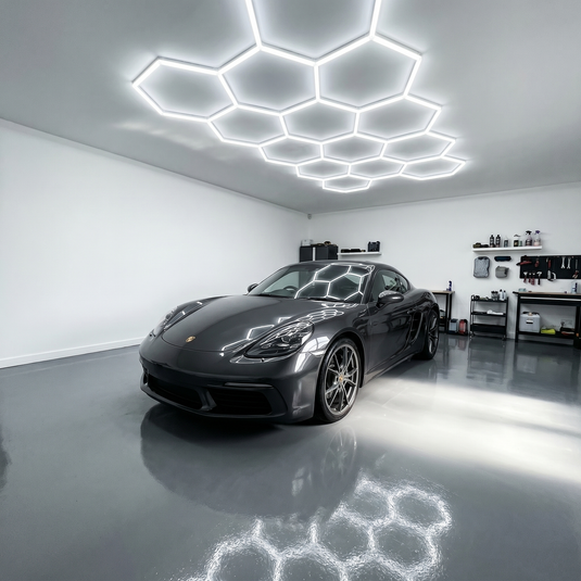 14 hexagon LED light kit lit above a car in a garage