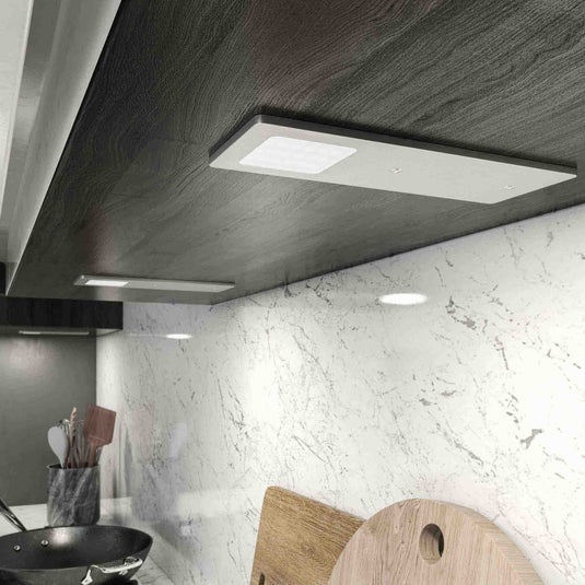Kitchen worktop lit by three Recti cabinet lights