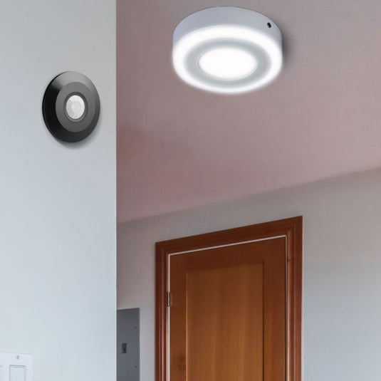 Black slimline PIR sensor mounted in place