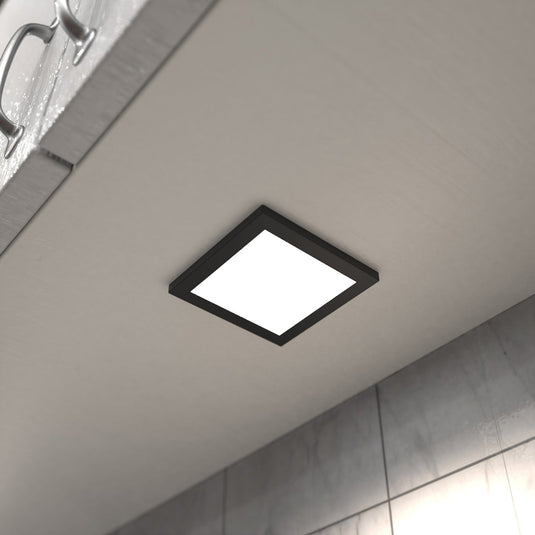 Close up of a cabinet light under a kitchen cabinet