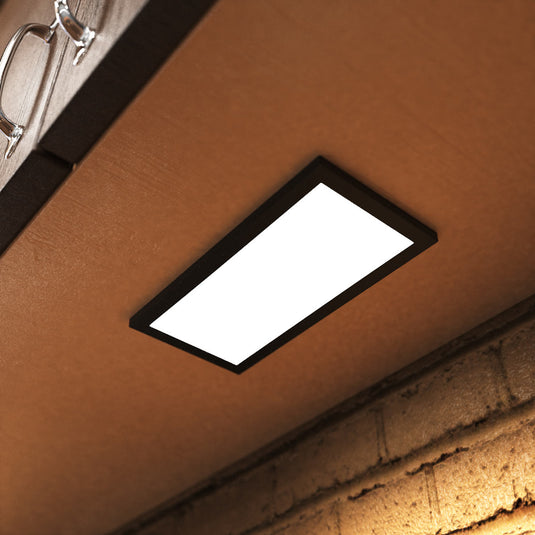 Close up of a cabinet light under a kitchen cabinet
