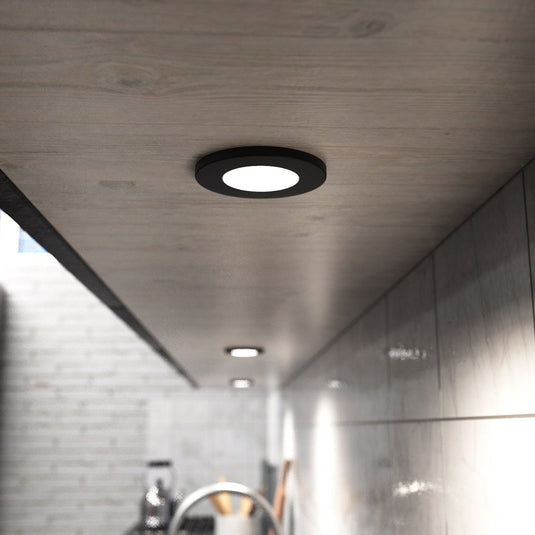 Natural white cabinet light under a kitchen counter