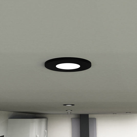 Black downlights in a kitchen ceiling