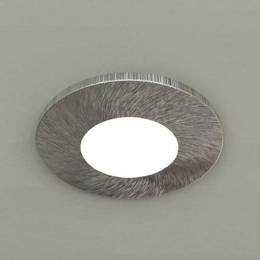 Satin nickel downlight in a kitchen ceiling