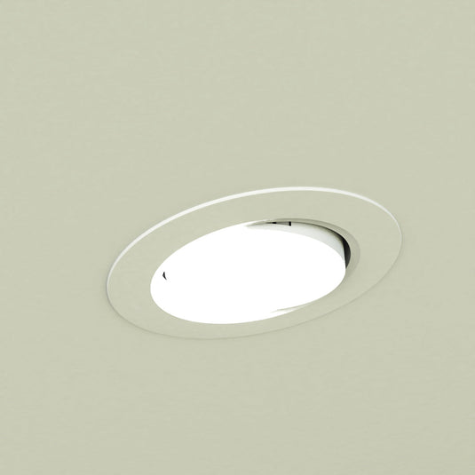 Close up of a white tilt downlight in a ceiling