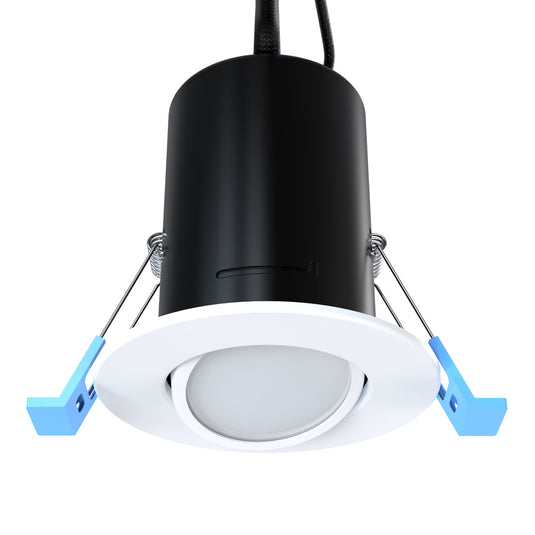An adjustable downlight with a tilted gimbal with a black can body behind the white bezel.