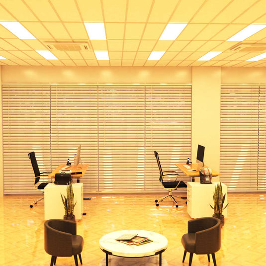 Office lounge lit by warm white panels