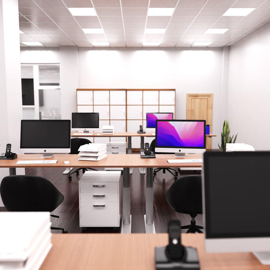 Bright office lit by cool white LED panels