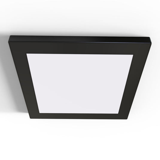 Surface mounted cabinet light with black bezel