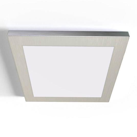 Square cabinet light on a white surface
