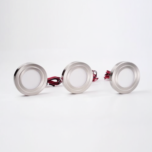 Three of the brushed nickel cabinet lights