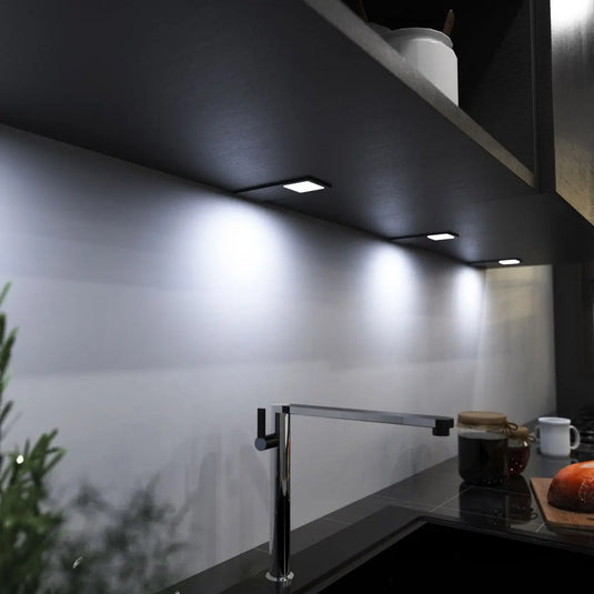 Black Recti Superslim 5w LED Cabinet Light, above the sink in cool white light