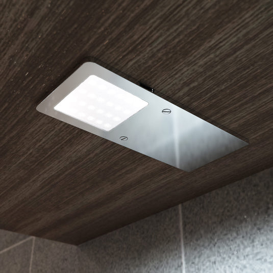 Cool white LED cabinet light fitted under a kitchen unit