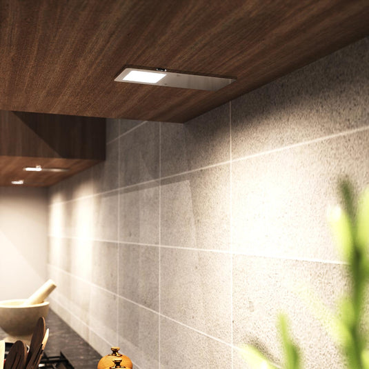 Row of natural white LED cabinet lights under kitchen units