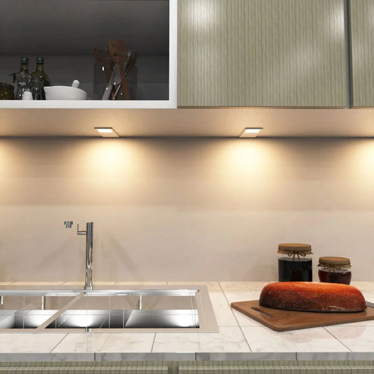 Recti Superslim 5w LED Cabinet Light, Matte White, above the sink setting in warm white light