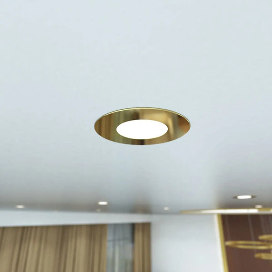 Fire Rated Downlight, Brass in cool white light mounted in ceiling