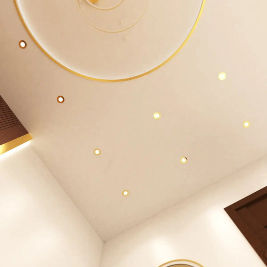 Fire Rated Downlight, Brass in natural white light ceiling facing shot