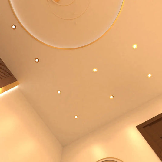 Fire Rated Downlight, Brass in warm white light ceiling facing shot