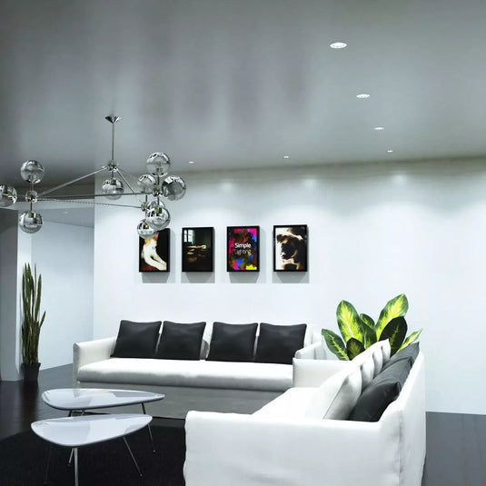 GU10 Downlight, Fire Rated In Brushed Chrome in cool white light sofa area living room setting