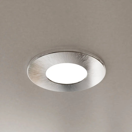 GU10 LED Downlight brushed chrome in cool white light close up ceiling setting