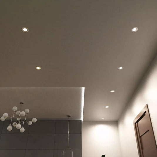 Ceiling with mounted natural white brushed chrome downlight