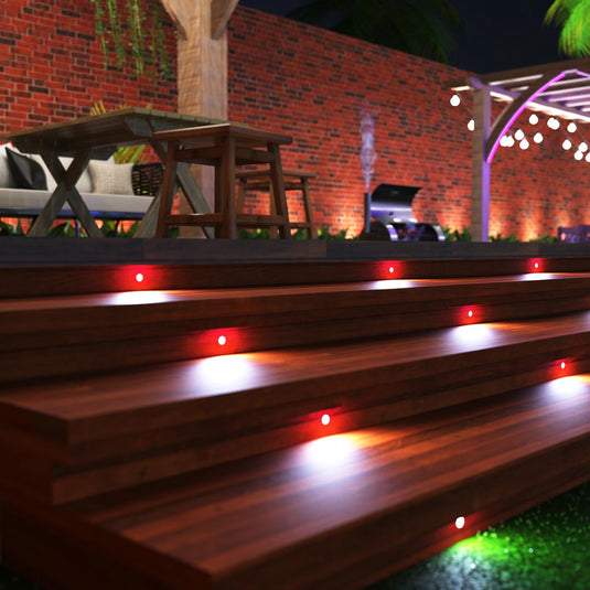 Decking boards lit by cool white decking lights