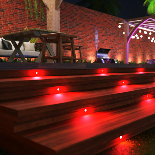 Decking steps lit by red deck lights