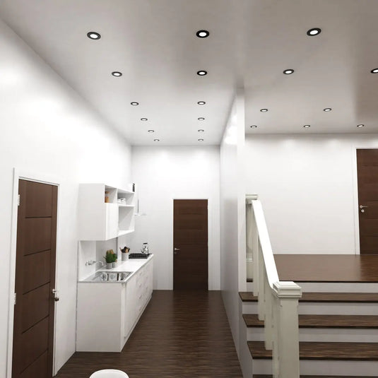 Tilt, Fire-Rated Downlight in a Matt Black Finish hallway setting